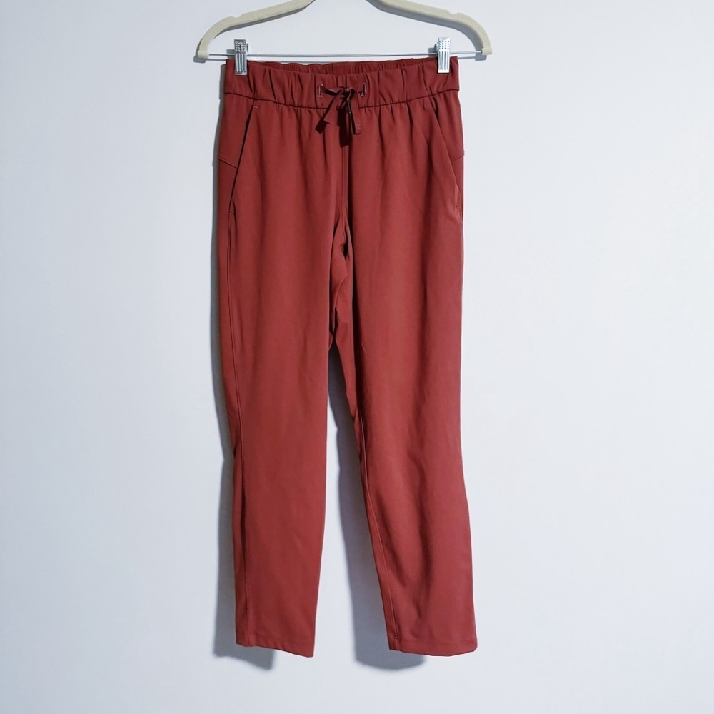 Lululemon - Rust Red On The Fly Pants